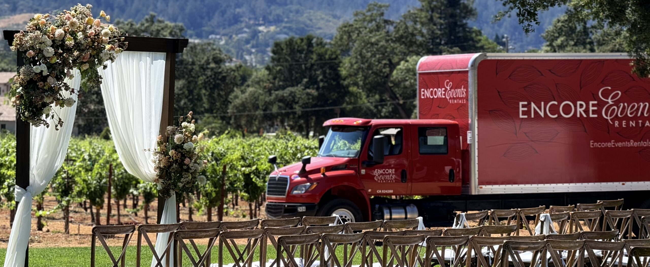 Encore Events Rentals delivery truck at a vineyard wedding